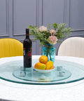 Super Smooth Tempered Glass Lazy Susan For Dining Table 360 Degrees Turntable with fruits and wine on a round glass tray.