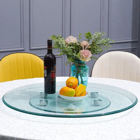 Super Smooth Tempered Glass Lazy Susan For Dining Table 360 Degrees Turntable with fruits and wine on a round glass tray.