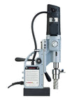 Premium Magnetic Drill Press With Rock Solid 1850 Lb Hold Fast And Killer 14.5 Amp Motor For No Sweat Metal Cutting Up To 2 3 16 Inch Annular Hole Saw Capacity Featuring Oil Lubricated 2 Speed Gearbox For Heavy Construction Jobs, side view with detailed controls.