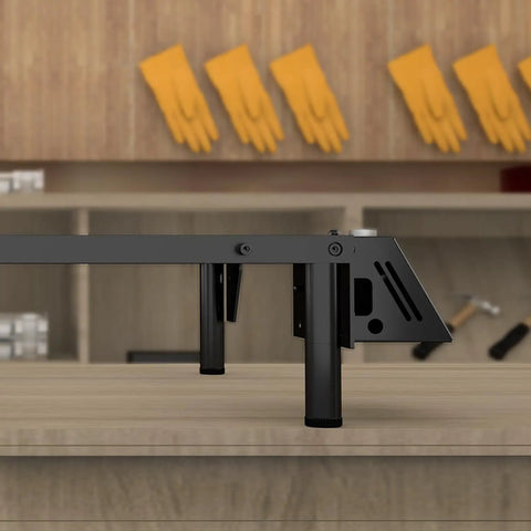 Level Up Your Shop With This Straight Fire 360 Degree Laser Rotary Roller And 8 Piece Riser Pads Kit For Ray 5 Engraver side view on a workbench.