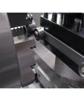 Close-up of lathe centering and truing tool with half inch square tool head, mounted on AXA tool holder in use.