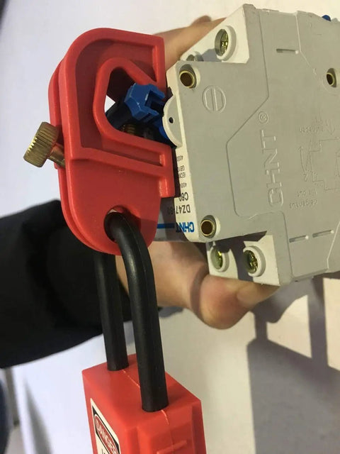 Legit Heavy Duty Universal Circuit Breaker Lockout Three Pack With Padlock Shackle on a circuit breaker, showcasing tool-free setup.