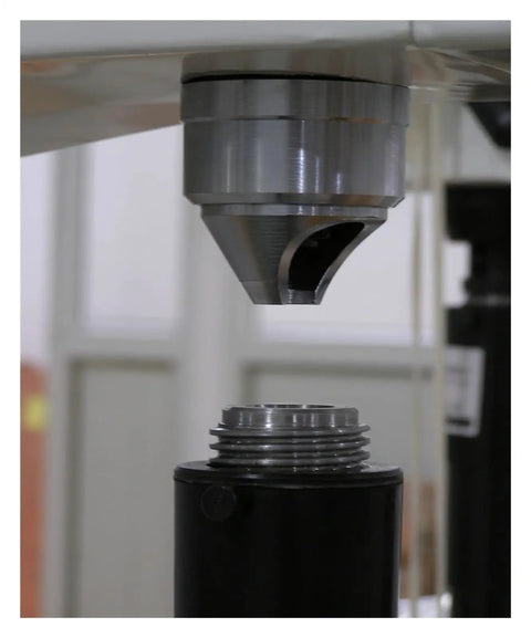 Close-up of HR150A Manual Durometer Gauge Dead On Accurate Hardness Tester Meter showing metal measuring tip for rubber and foam.