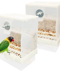 Real Deal Automatic Bird Feeder With Super Slick Waste Catcher And Split Bowl Design For Cockatiel Parrot And Parakeet Cage Accessories Totally Hassle Free Setup Two Pack with a green parrot and grain.