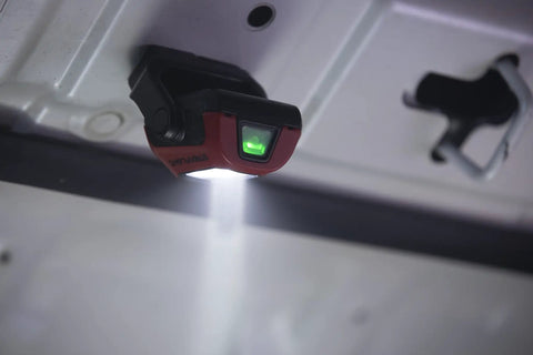 Syclone 400 Lumen USB Rechargeable MultiFunction Compact Work Light With Magnetic Base And Stowable Hook Hands Free For Inspections And Repairs Bright Red Finish For Garage Or Workshop Use Boss Level Brightness installed in vehicle