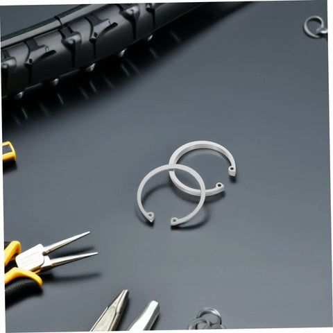 Stainless Steel C Clip Set 5 Pack With Grooved Retaining Rings And Elastic Snap Rings for DIY projects, tools visible
