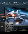 Plug And Play Heavy Lifter Four Bay Sata Storage Enclosure For 2.5 And 3.5 Inch Drives With Chill Operating Fan, Usb C 3.1 Ports, Seven Quick Swap Raid Modes, And Rock Solid 96 Terabyte Bulk Capacity For Your Tech Rig beside a 4K TV screen.