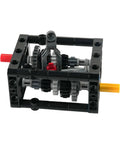 Close-up of Hands On 5 Speed Manual Transmission Model Kit With Differential Gear And Wave Box featuring gears