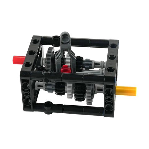 Close-up of Hands On 5 Speed Manual Transmission Model Kit With Differential Gear And Wave Box featuring gears