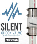 ProCheck silent sump pump check valve – side view; stainless steel couplings on 1-1/2 in PVC pipe; clear body.
