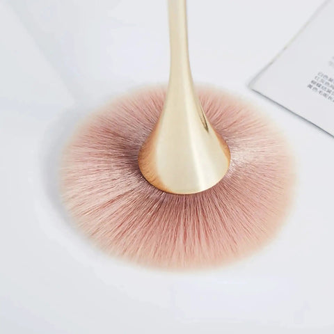 Close-up of gold-handled brush from 2 Pack Nail Dust Brush Cleaners For Acrylic Dip Powder Makeup And Blush Large Manicure Cleanup Tools