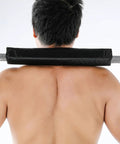 Barbell Squat Pad With Thick Foam Cushion For Neck And Shoulders on bar, weight lifter using anti slip pad for weight lifting