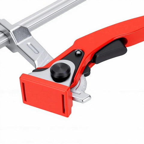 Close-up of Heavy Duty Bench Dog Clamp Five Eighth Inch Hold Down Ratchet Clamp with red jaws for woodworking.