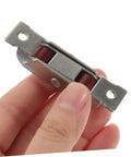 Heavy Duty Double Flat Sash Rollers And Slick Sliding Window Pulleys For Glass Doors And Barn Tracks Premium Glide Hardware Kit, held in hand.