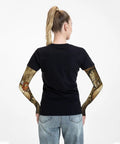 Woman showing back view of Kickin Steampunk Arm Sleeves Legit Sun Protection Fingerless Garden Gear lightweight UV blocking covers.