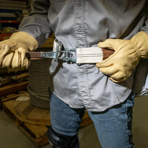 Worker demonstrating Heavy Duty Tool Belt with Mildew Resistant Cotton Polyester Webbing and a Forged Quick Release Buckle