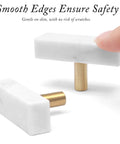 Sweet Finish T-Shaped Marble Cabinet Knobs With Brushed Brass Base, sharp drawer pulls showcasing smooth white marble edges.