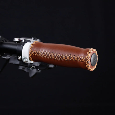 Soft Cushioned 127mm Vinyl MTB Grips For Mountain Bikes And Beach Cruisers Beefy Comfort Grips 22.2mm Handlebar Diameter Non Slip Grip Shock Absorbing Easy Install Brown shown on a handlebar