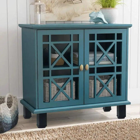 Blue cabinet with decorative glass doors and black adjustable legs, featuring baskets inside, displayed in a stylish interior.