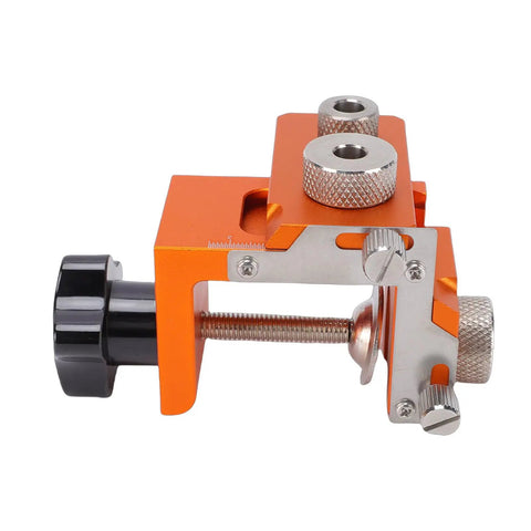 Rock Solid Double Hole Drilling Positioner With 12mm Eccentric Nut Drill Guide, orange aluminum body with adjustable clamps for woodworking.