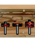 3-Piece Glass Panel Router Bit Set In Hardwood Case, 1/2-Inch Shank, Carbide-Tipped in open wooden case view
