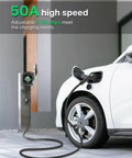 Top Notch Level 2 Electric Vehicle Charger 50 Amps With Smart Display And Adjustable Amperage For Lightning Fast Home Charging Compatible With Nema 14-50 Plugs For Any Sweet Ride On The Daily Commute Today charging a white electric vehicle in a modern garage.