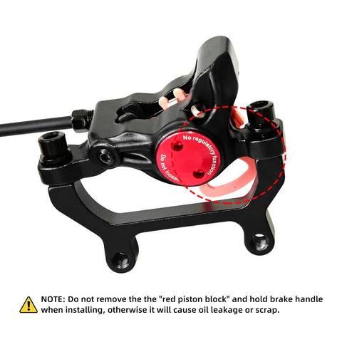 Side view of Z00M HB875E eBike hydraulic disc brake caliper; black body with red circular adjustment knob