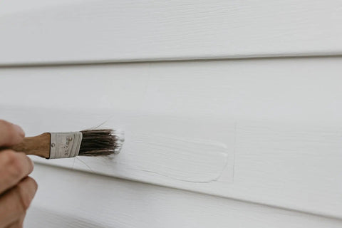 Applying paint on Vinyl And Stucco Siding Repair Kit With White Self Adhesive Patches That Cut To Fit Paintable To Match Cover Cracks Holes And Blemishes Weather Resistant Indoor Outdoor Use Includes 2 Patches