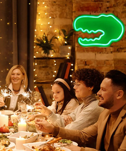 Family dinner with Totally Lit Dinosaur Head Neon Sign For Kids Bedroom Decor USB Or Battery Powered Neon Light in the background.