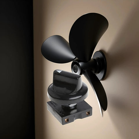 4 Position Ceiling Fan Speed Switch With 3 Speeds And Off Dope Black Rotary Controller With Button Governor Isolator And Wall Control For Pro Grade Home Ceiling Fans, shown next to a black ceiling fan on a wall.