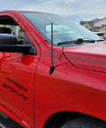 Red pickup truck with 2 Pack Short Truck Antennas For Universal Fit On Ford F Series Ram Dodge Chevy Silverado GMC Sierra