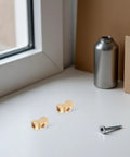 Brass Pneumatic Tee Fittings Block Shape Set 4 Pieces Pro Grade With Precision Threads Copper Connectors on table