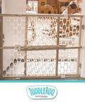 Wooden Baby Gate With Mesh For Doorways, Quick Fit Pressure Mounted, 26.5 to 42 inches wide, 23 inches tall, in cozy home setting