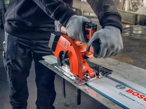 Built Tough Cordless Circular Saw For Spark Free Cold Cuts On Sheet Metal And Steel Pipe Works Like A Charm With Standard 18V Packs Comes Loaded With Two Heavy Duty Batteries And Quick Charger in operation on metal sheet. 