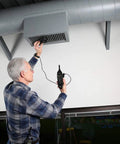 Technician using EM54 HVAC and Refrigeration Environmental Meter for Pros Continuity Testing of Nonenergized Components