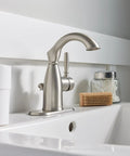 Sarona Spot Resist Brushed Nickel One Handle Bathroom Sink Faucet with Single Hole Design and Optional Deck Plate installed on sink
