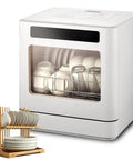 Game Changer Countertop Dishwasher nails dirty dishes with smooth 800 watt performance visible with clean dishes inside.