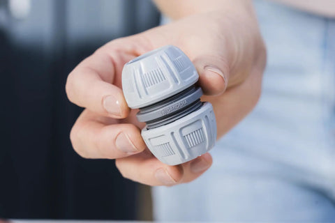 Close-up of Five Eighth Inch Hose End Repair Kit for Garden Hose Fittings, showing the Secure Power Grip Connector.