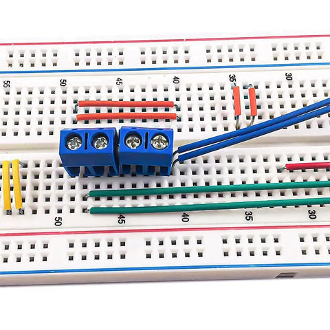 560 Piece Breadboard Jumper Wires Set For Arduino And Electronics, 24 AWG U Shaped Male To Male Cables in use on breadboard