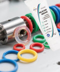 Product image of Multi Purpose Silicone Grease For O Rings And Electrical Connectors Dielectric Lubricant next to various o-rings.