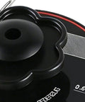 Close-up of Universal EV Charger Retractable Cord Reel top with black flower-shaped mount for secure cable storage.