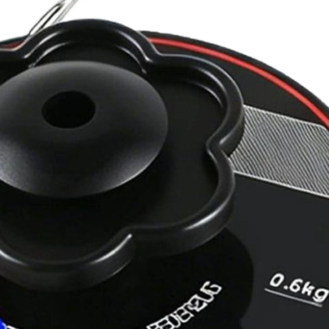 Close-up of Universal EV Charger Retractable Cord Reel top with black flower-shaped mount for secure cable storage.