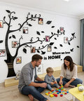 3D Dope Tree Wall Decals with DIY Photo Frame for Family Portraits in living room, shows tree mural and family playing together.