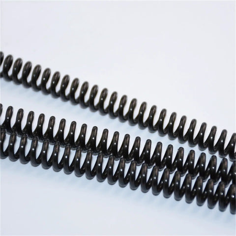 Close-up of 2Pcs Extended Extra Long Pressure Springs Made From Tough 65Mn Spring Steel, showcasing coils and durability.