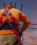 Worker wearing Premium EagleLite Harness With Tongue Buckles And 3 Steel D Rings For All Day Fall Protection On Construction And Industrial Jobsites.