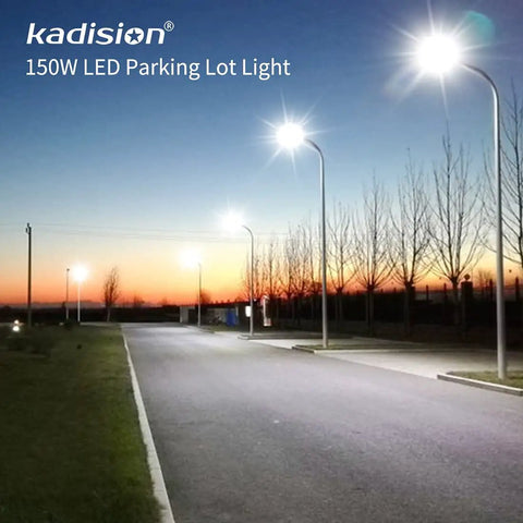Beefy LED Parking Lot Light illuminating a street at dusk with 150W power, showcasing bright uniform light and slip fitter mount
