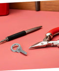 Heavy Duty M6x20 Stainless Steel Threaded Eyebolts With Nut And Washer Rock Solid Hook Bolts For Lifting And Hoisting Includes Nylon Nut And Flat And Spring Washers For Anti Loosening Protection Durable Industrial Grade Fasteners, M6 eyebolts on pink surface