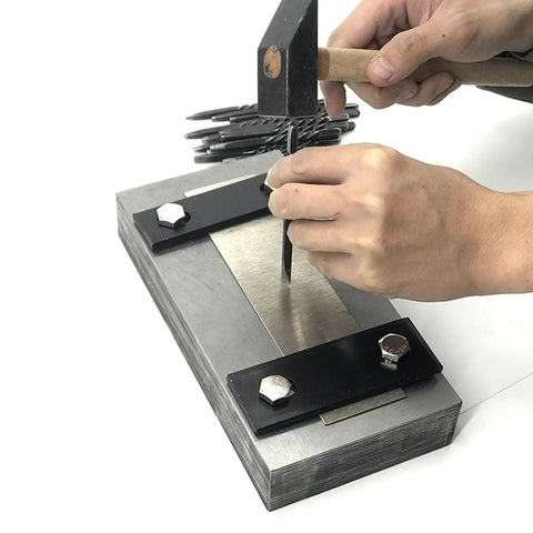 Using Metal Stamping Kit With 0.2 Inch Shank Stamps And Jewelry Anvil Chisel Set For DIY Jewelry Making And Crafting on a metal slab