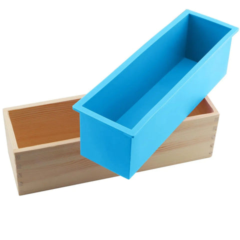 Ultimate 7 Piece Soap Making Kit With Silicone Molds And Stainless Steel Slicers, blue and wood rectangular loaf mold shown
