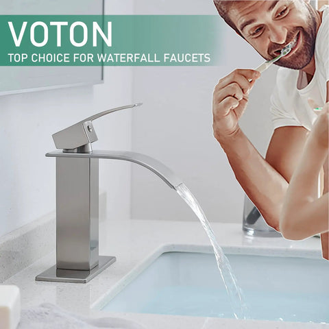 Brushed Nickel Waterfall Bathroom Faucet With Modern Single Handle For 1 Or 3 Holes With Deck Plate shown in use at a bathroom sink
